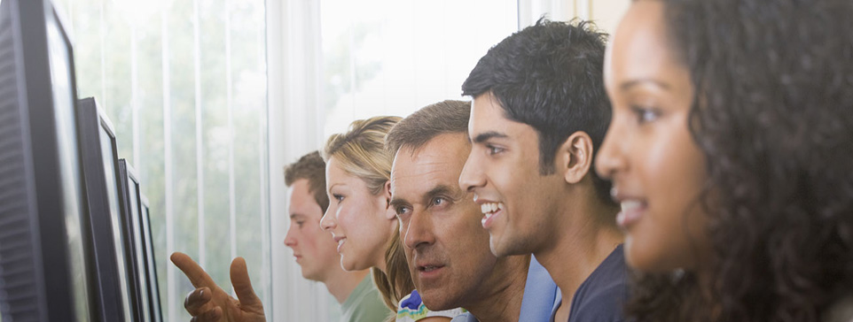 Males and females looking at computer screens